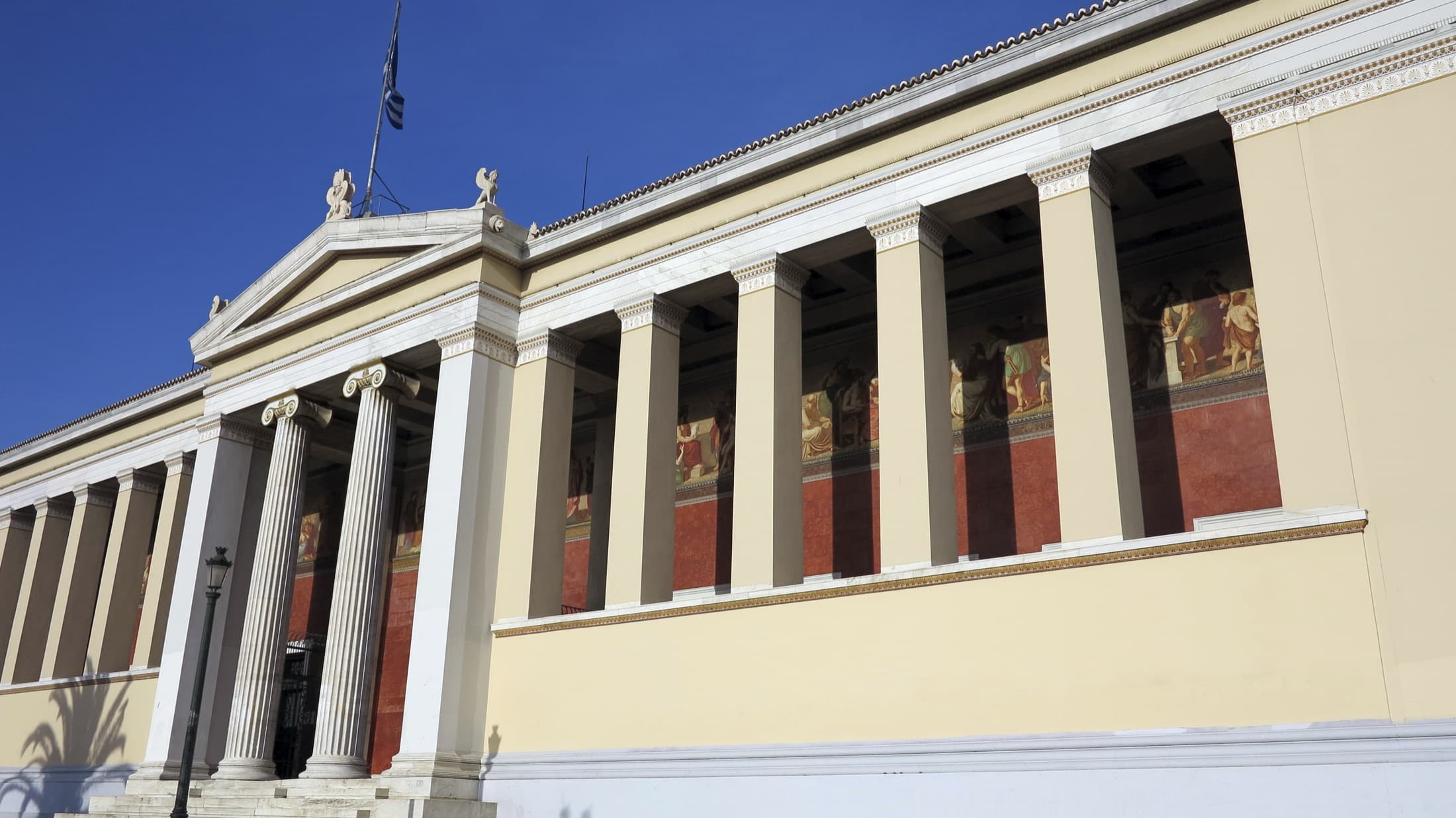 Neoclassical columns and sculpture at the Academy of Athens
